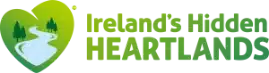 Logo for "Ireland’s Hidden Heartlands" featuring a stylized green heart with a white winding river and trees inside. Text is to the right of the heart.